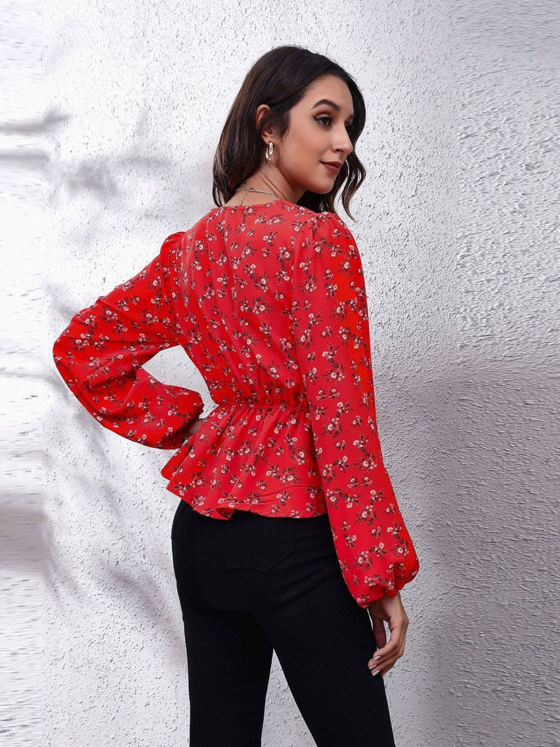 Ruched Printed V-Neck Long Sleeve Blouse