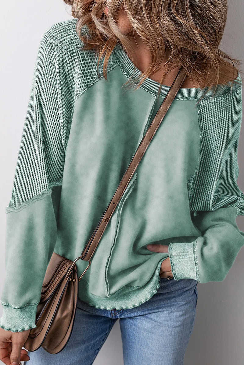 Karina Exposed Seam Long Sleeve Sweatshirt